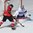PARIS, FRANCE - MAY 9: France's Cristobal Huet #39 poke checks the puck away from Switzerland's Cody Almond #89 during preliminary round action at the 2017 IIHF Ice Hockey World Championship. (Photo by Matt Zambonin/HHOF-IIHF Images)

